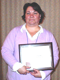 photo of Clara hudson holding her award
